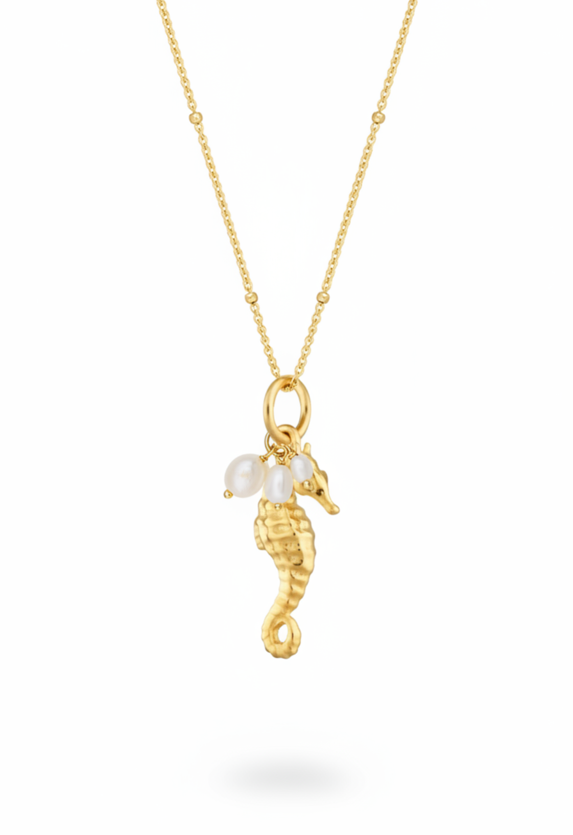 Sea horse and pearl cluster necklace